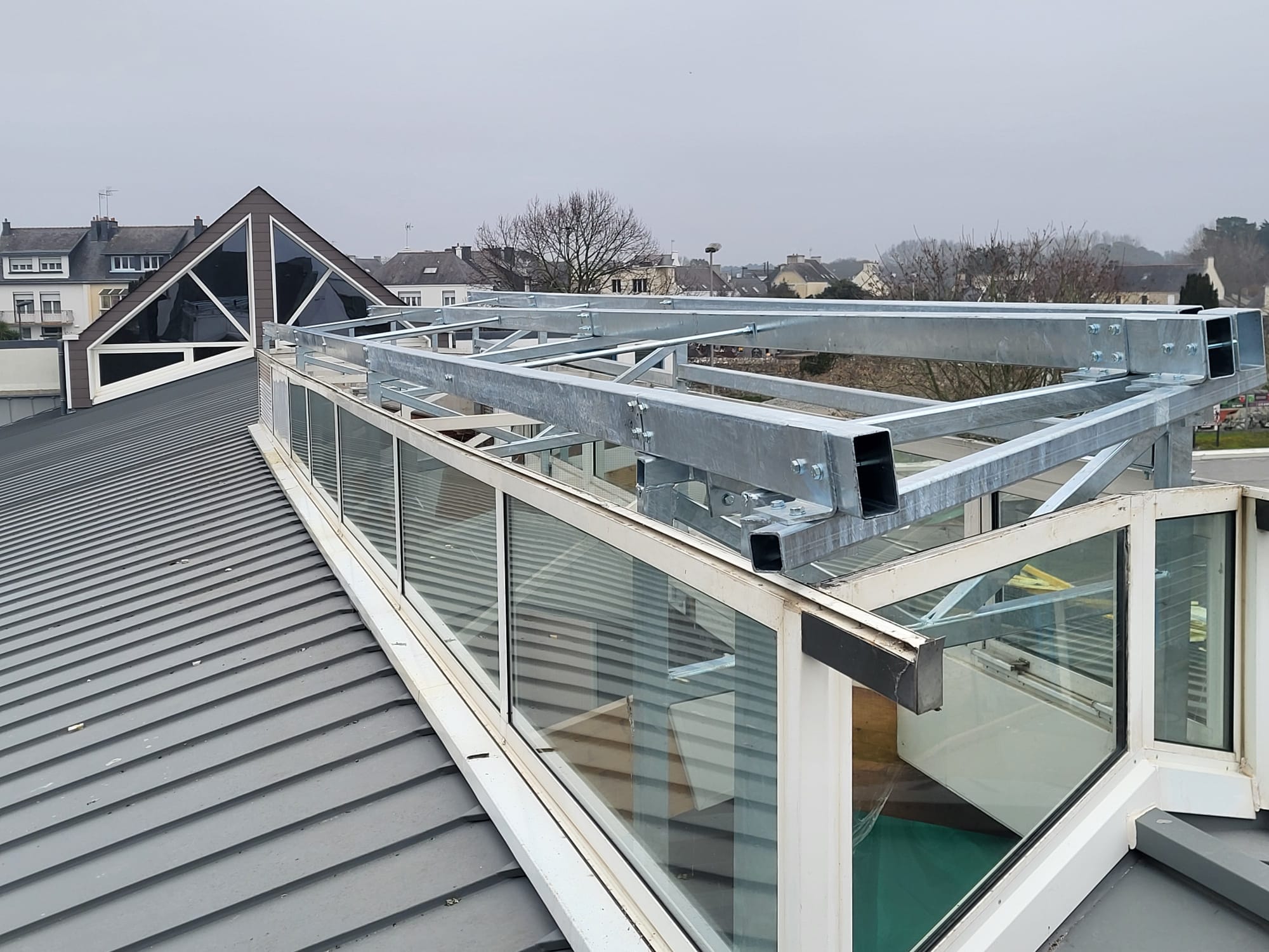Rénovation toiture verrière - extension métallique